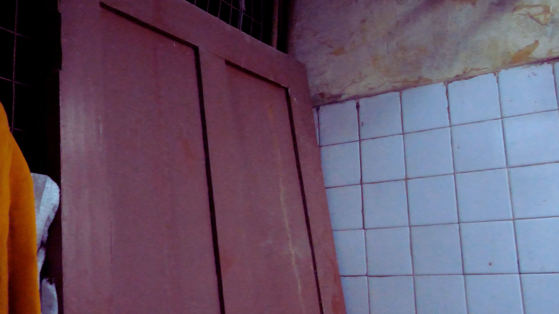 Broken door at the female shelter home